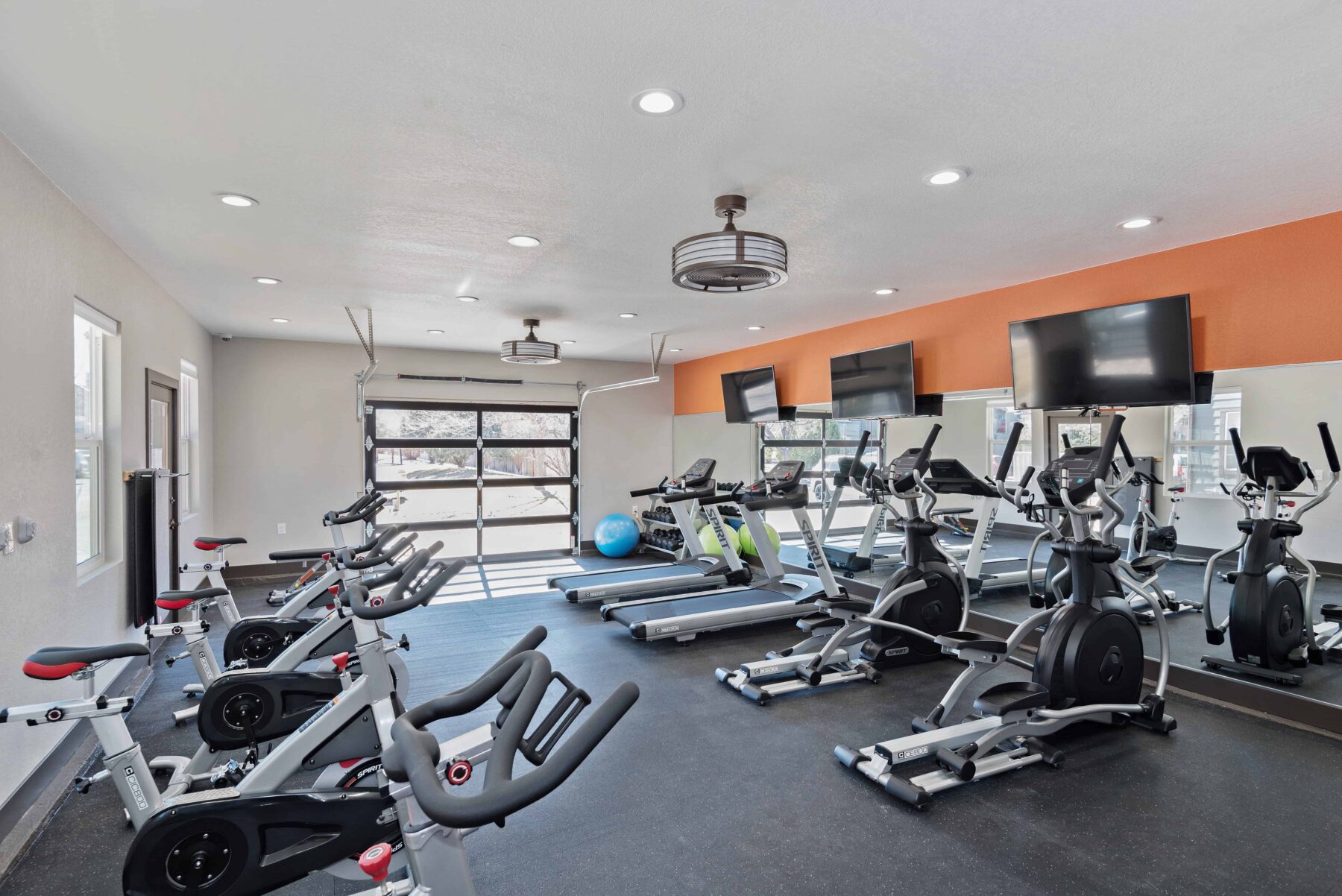 Fitness center with weights & modern machines for cardio