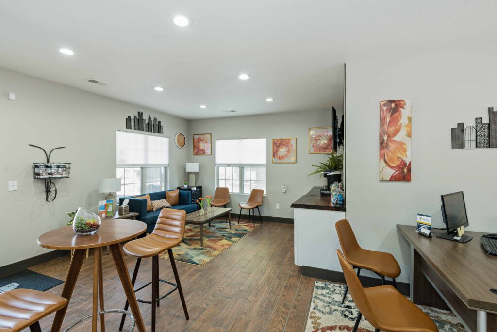 Leasing office lobby with sofas and coffee station